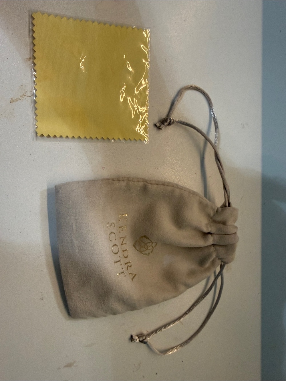Kendra Scott Taupe Velvet Drawstring Pouch with Gold Logo with polishing cloth